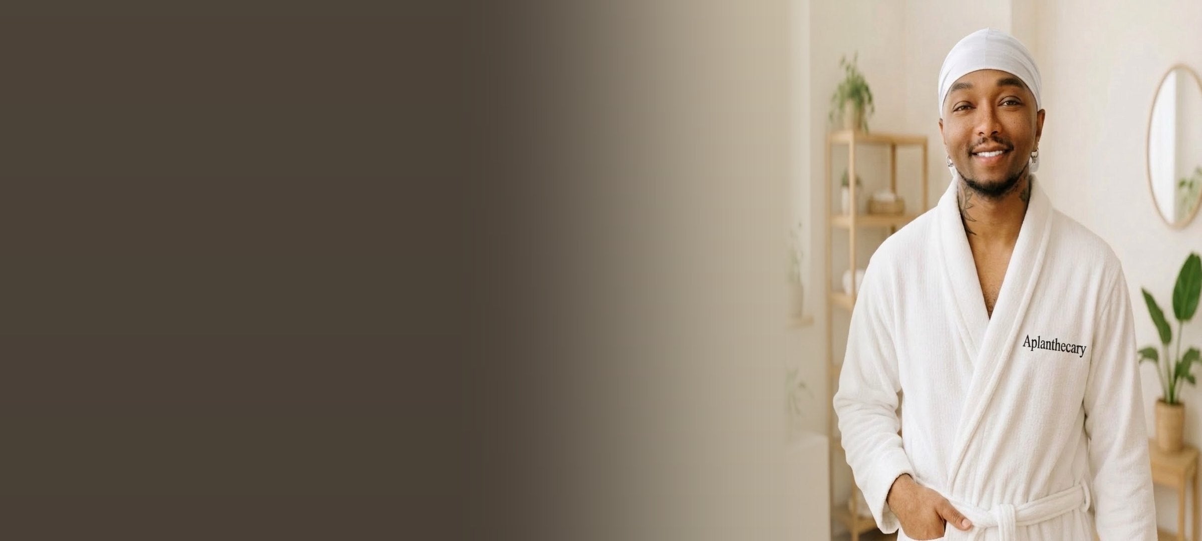 Jujhar Negrron, founder of Aplanthecary, in an Aplanthecary robe
