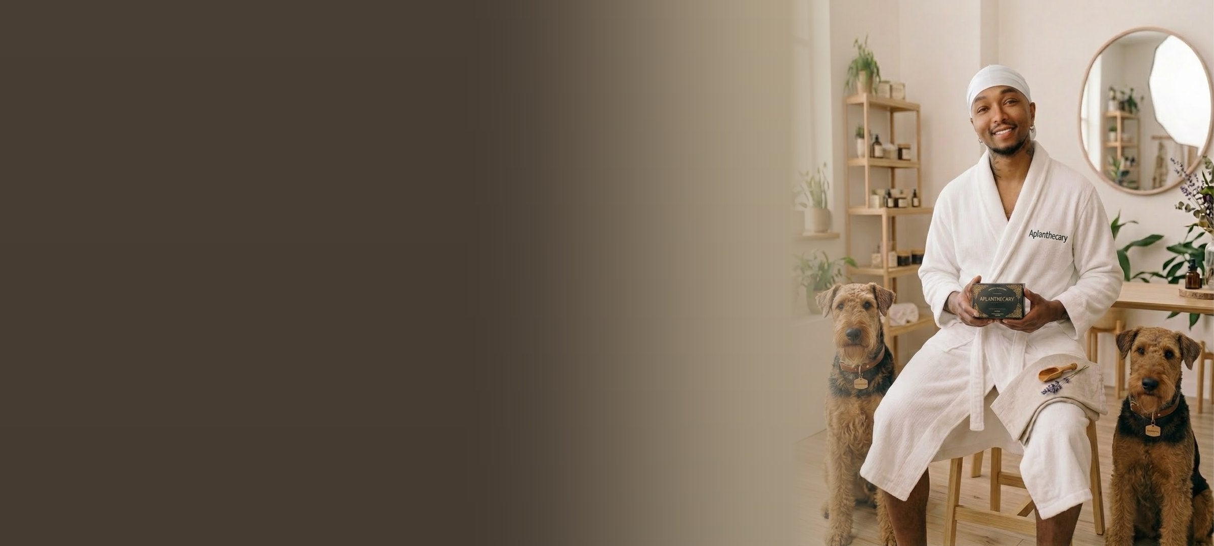 Jujhar Negrron, founder of Aplanthecary, with his two Airedale terriers